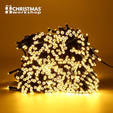 String of lights with 'The Christmas Workshop' logo on a warm background